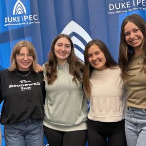 6 student posing for a photo