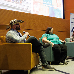 Rosa Gonzalez-Guarda, PhD, MPH, RN, FAAN, second from right, speaks during a panel discussion with Fernando Orozco, MBA, left, Cecilia Marquez, PhD, second from left, center and Norma Marti, BA, far right, during ¡DALHE!’s Pesado & Perspectiva event 
