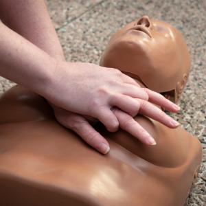 CPR administered to a manikin with breasts