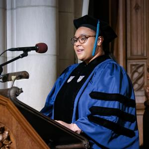 Sydney at the podium during her commencement address