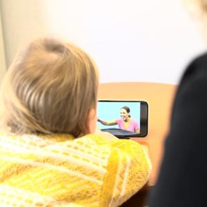 child viewing app on smartphone