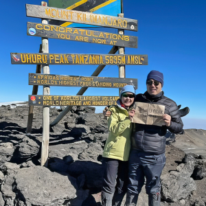 Dr. Shelley Hwang, MD, Mary and Deryl Hart Distinguished Professor of Surgery, and husband John Kim on top of Mount Kilimanjaro in Kenya. 