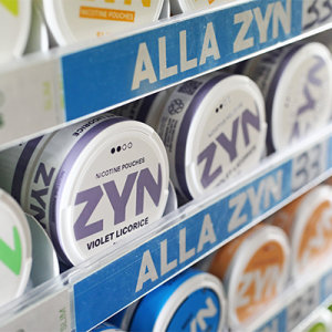 colorful flavored nicotine pouches on a store shelf