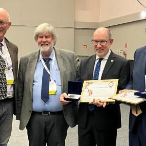 Joseph Heitman, MD, PhD, (second from right) at the 2025 Georg Award ceremony.